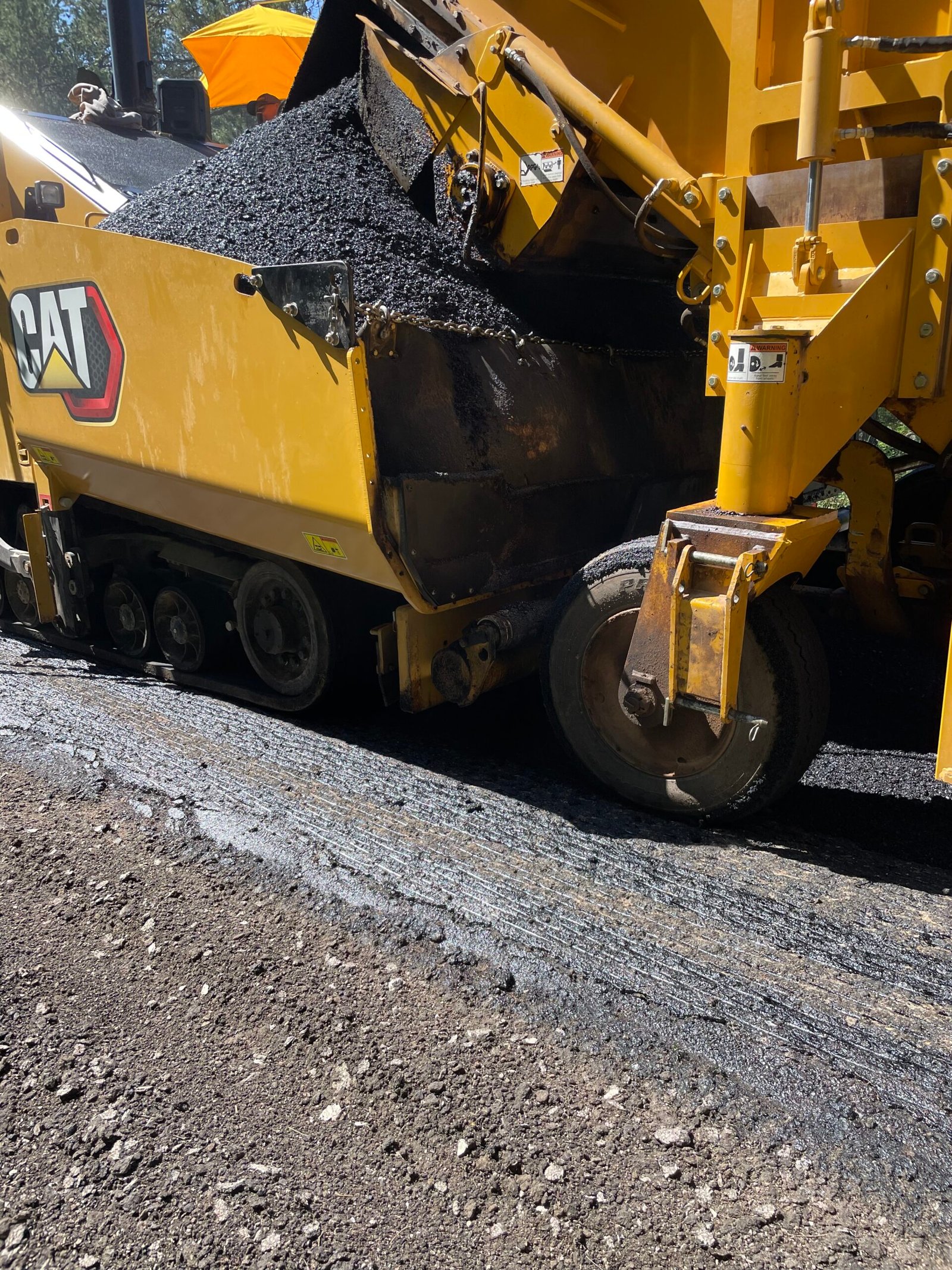 Paving Hopper Overflowing